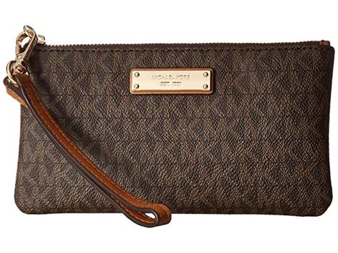 michael kors men's clutch bag|Michael Kors wristlet on sale.